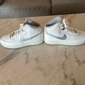 Nike- size: men’s 11, Air Force 1, color: white and silver, condition: used.